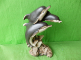 Soška tři delfíni